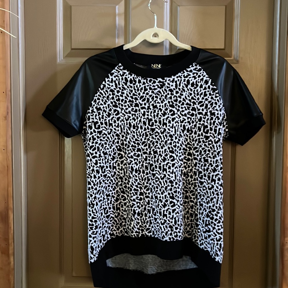 Never worn leopard black top.